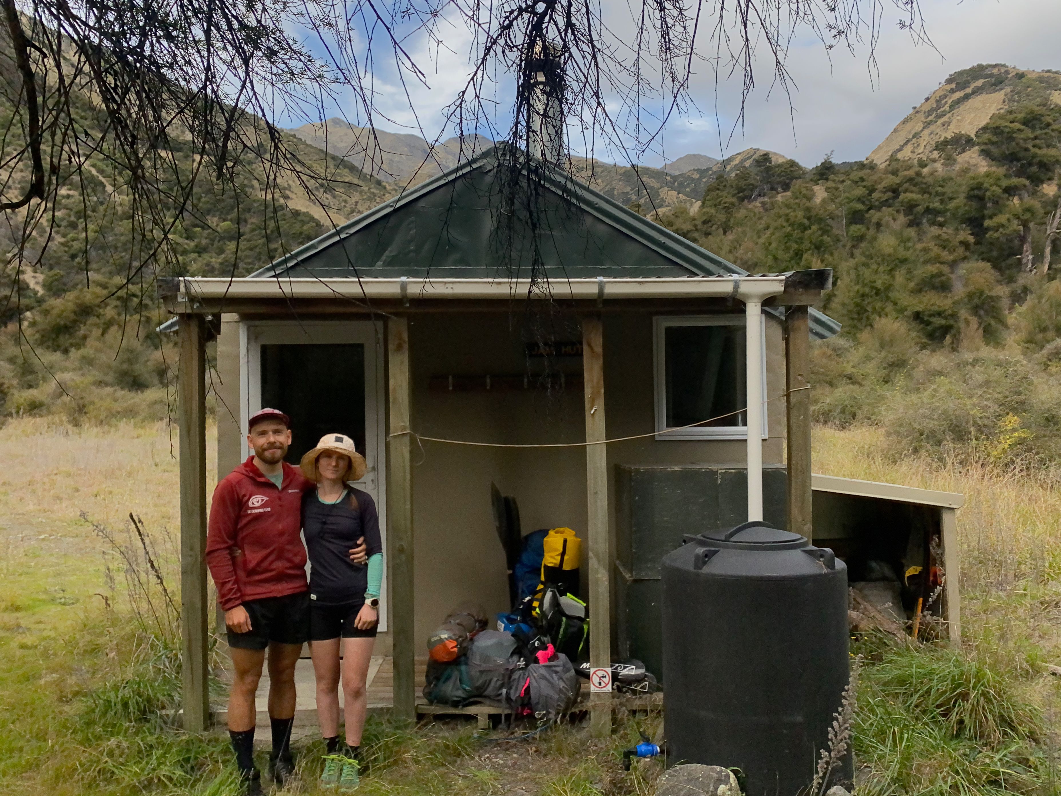 Jam Hut with water tank, woodshed and dog kennels all right by the porch. An excellent wee hut.