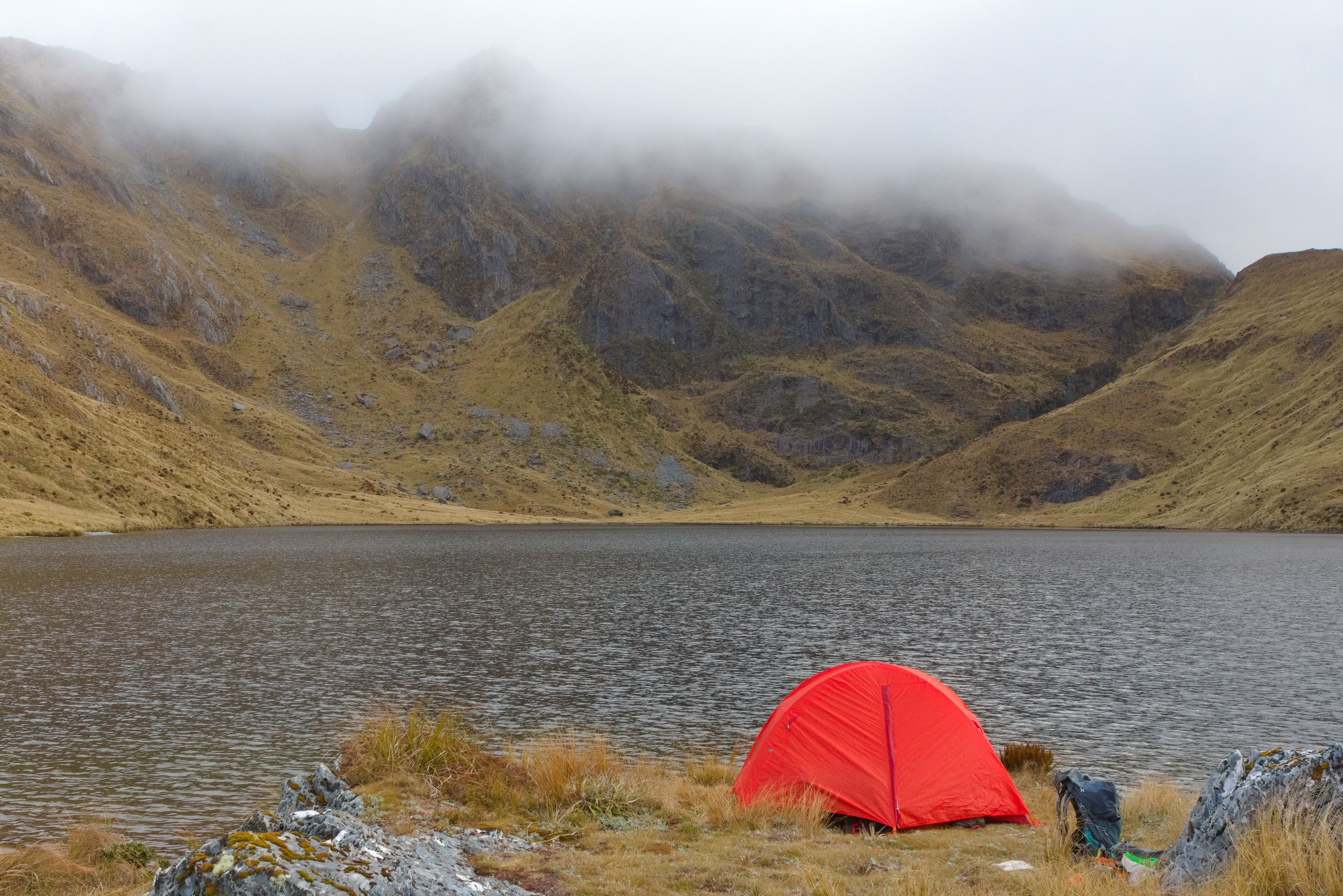 Campsite at Lake Morgan with Point 1489 obscured in cloud.