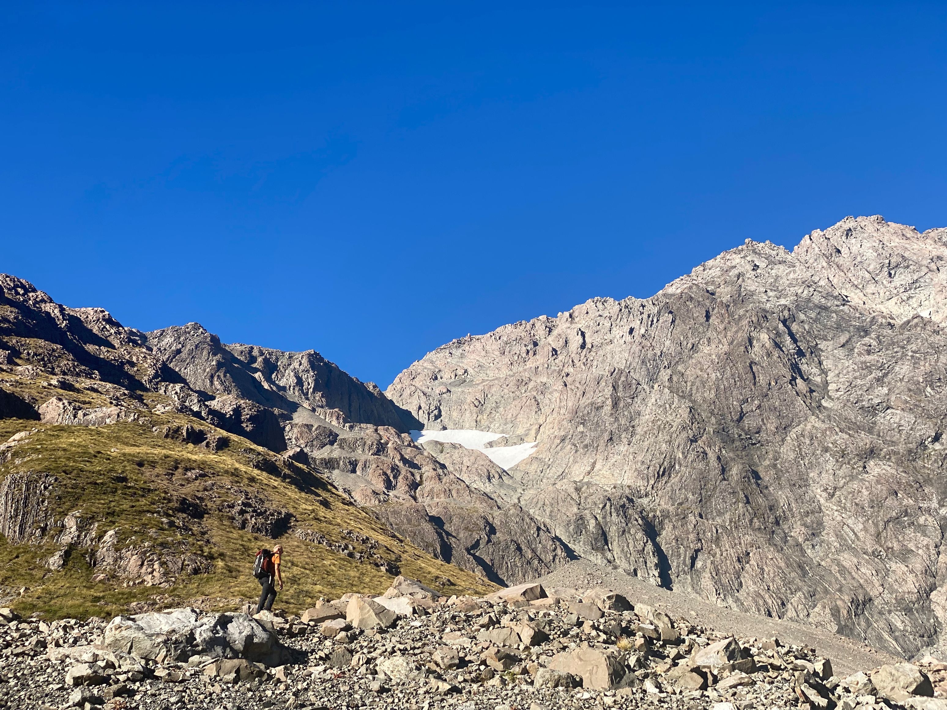 Dad looking up at Otira Face; our route up through the tussocks visible to his left.